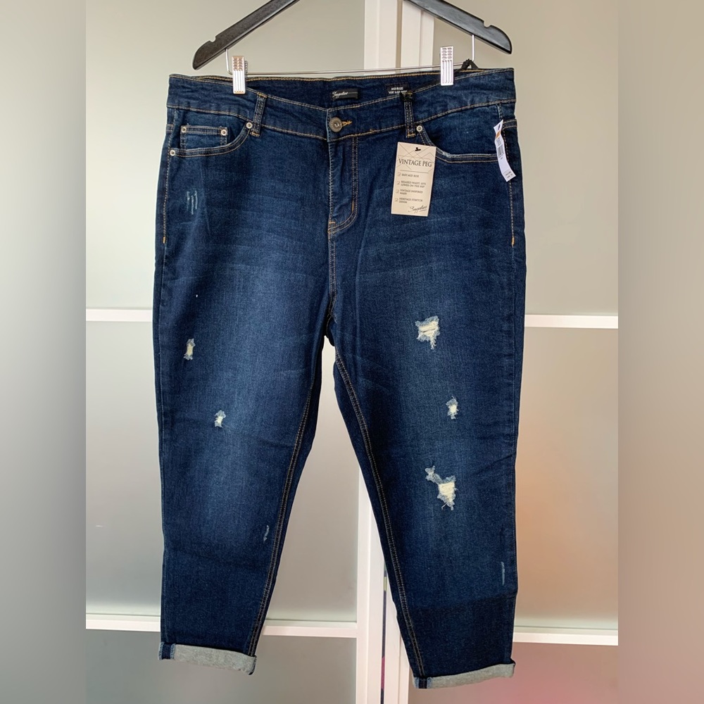 Supplies brand midrise vintage peg jeans with slight distressing. 16W. NWT.